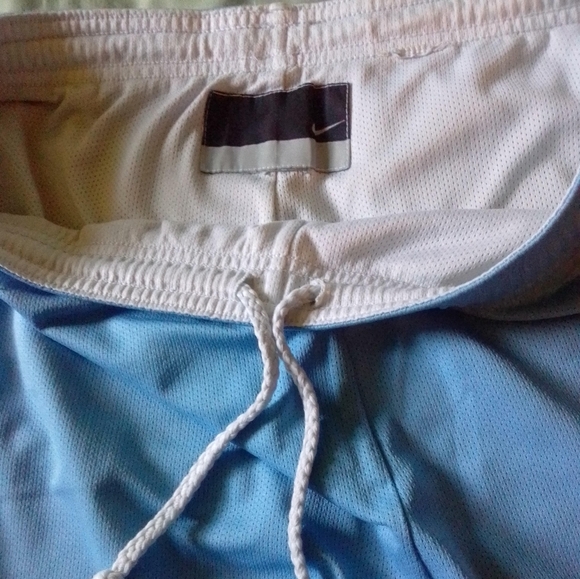 2 pairs Nike activewear shorts - 1 blue white pair, 1 orange pink neon pair - Picture 2 of 7